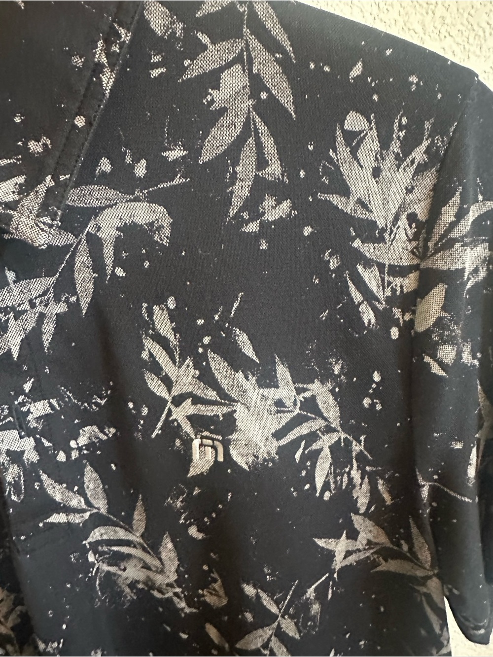 Travis Mathew Black Polo with Light Gray Botanical Print - Picture 4 of 4
